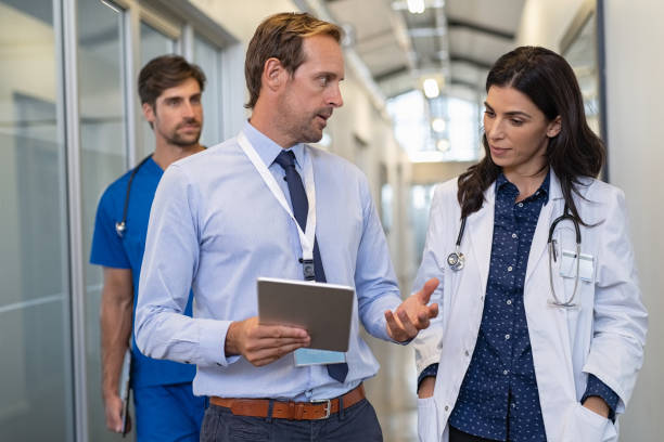 Medical sales representative speaking with a healthcare professional