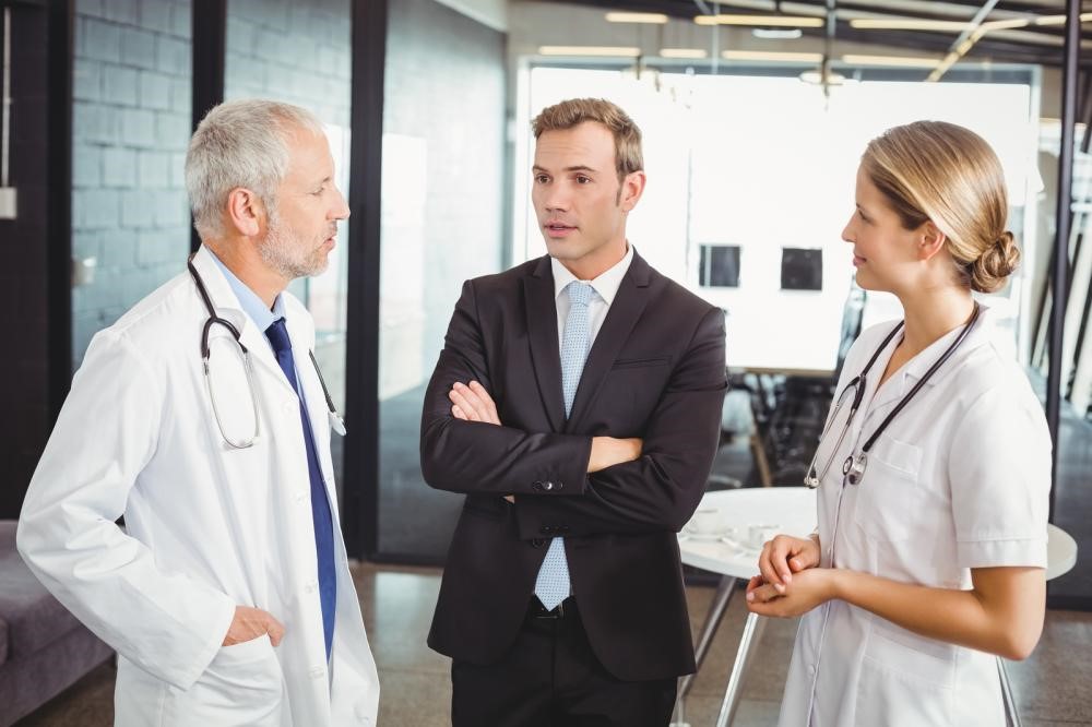Medical sales recruiter meeting with a professional