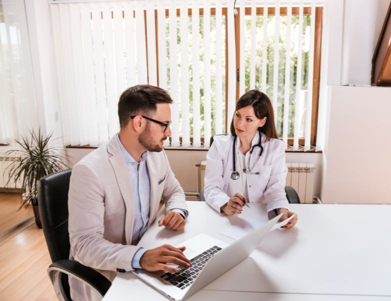 Medical sales representatives collaborating
